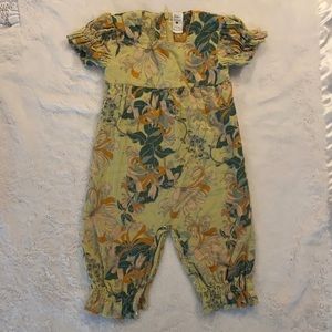Kate Quinn floral one piece outfit